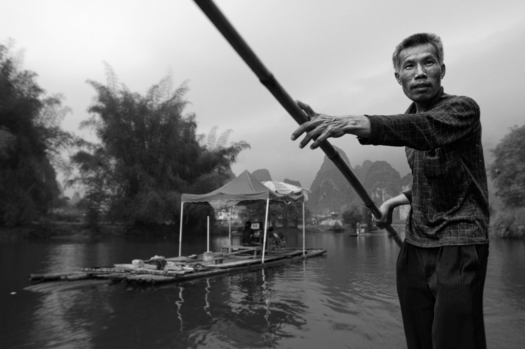 raft man~ Li river~ Guilin
